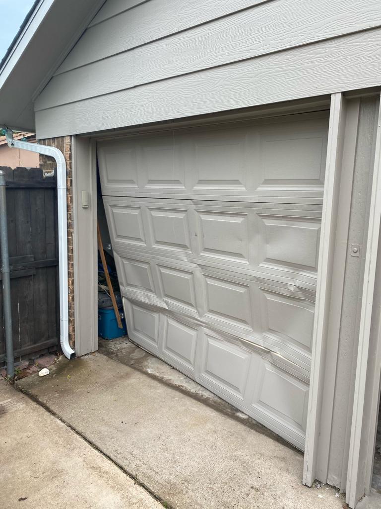 Matched replacement garage door panel installed by Garage Tec Matched replacement garage door panel installed by Garage Tec