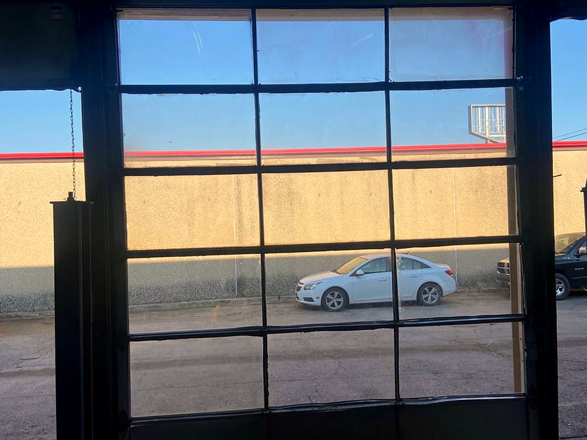 Full-view glass garage door